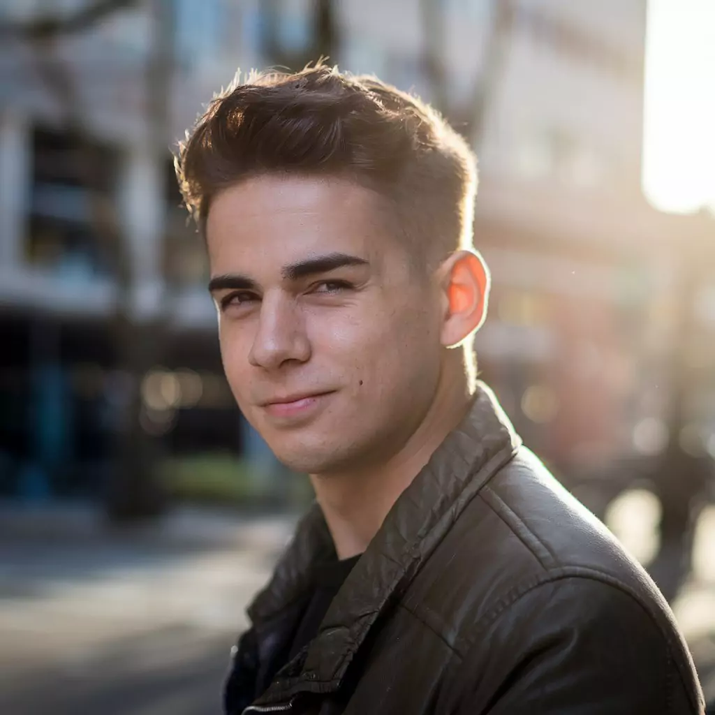 30 AI Art Prompts for Realistic Results ai art prompts for realistic results - A charismatic close-up portrait of a young man with a confident, engaging gaze